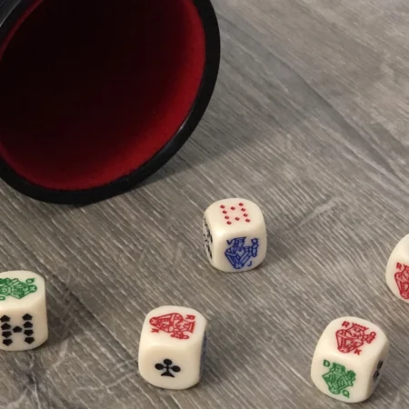 Poker Dice: Rules & Hand Rankings for the 5-Dice Classic (2026)